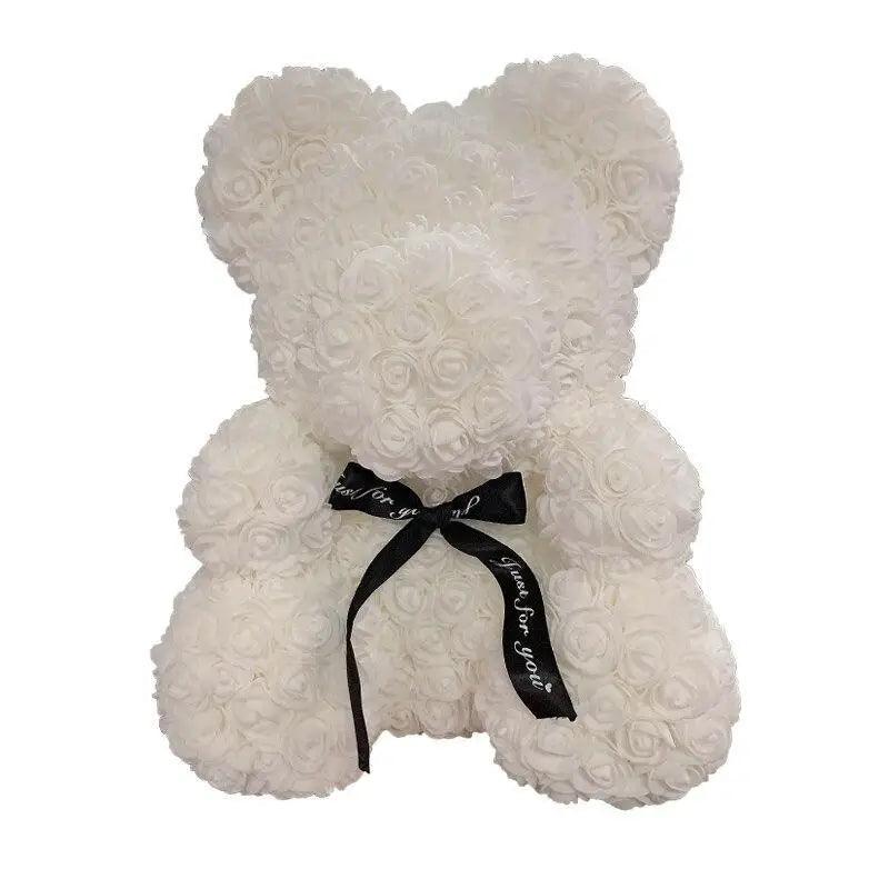Stevvex rose-covered teddy bear decoration in white artificial roses with black ribbon bow on Tampa Home & Garden Store