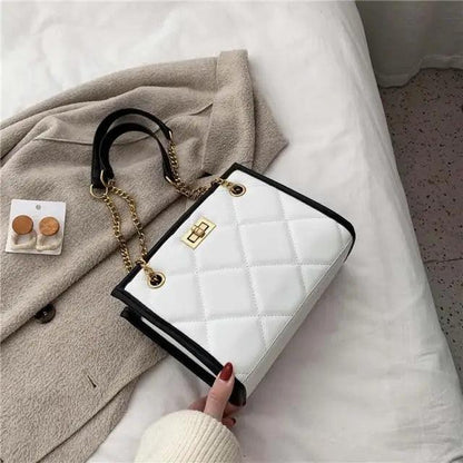 Stevvex white quilted PU leather shoulder bag with black trim and gold chain strap on Tampa Home & Garden Store