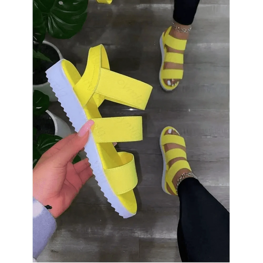 Stevvex yellow platform sandals with three straps open toe and chunky white sole visible on Tampa Home & Garden Store