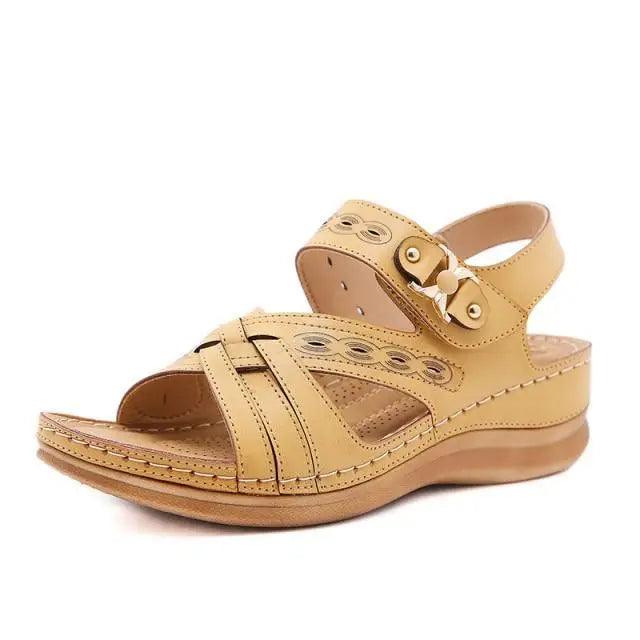 Stevvex tan buckle-strap women's sandals with decorative cutouts for comfortable wear on Tampa Home & Garden Store
