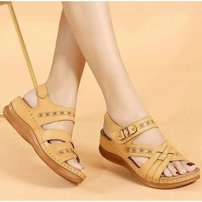 Women's tan leather sandals with buckle straps and cutout detail, wedge heel on Tampa Home & Garden Store