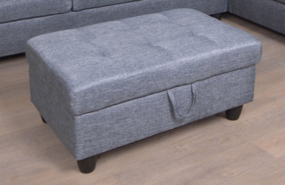 Gray fabric sectional ottoman with tufted top and rounded edges on Tampa Home & Garden Store