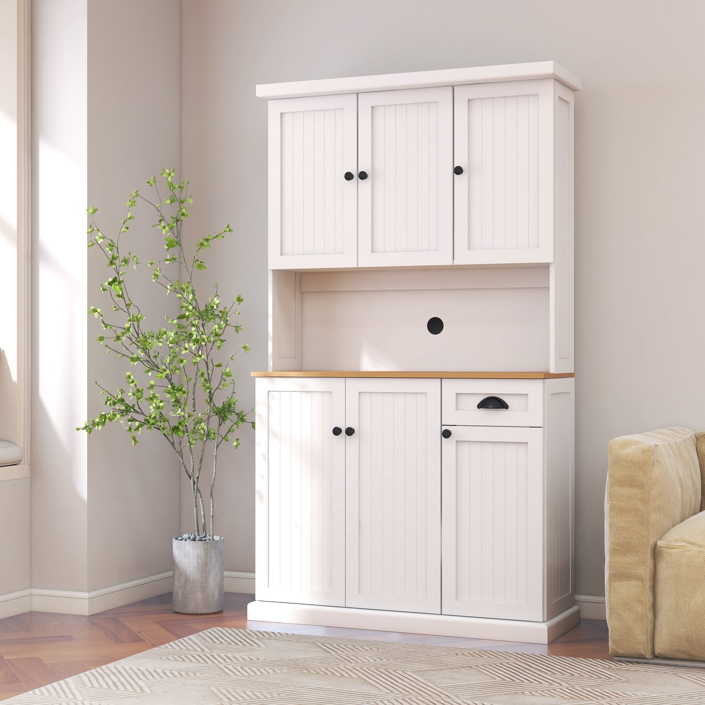 White kitchen pantry cabinet with beadboard doors and microwave countertop, black knobs on Tampa Home & Garden Store