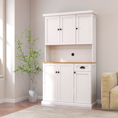 White kitchen pantry cabinet with beadboard doors and microwave countertop, black knobs on Tampa Home & Garden Store