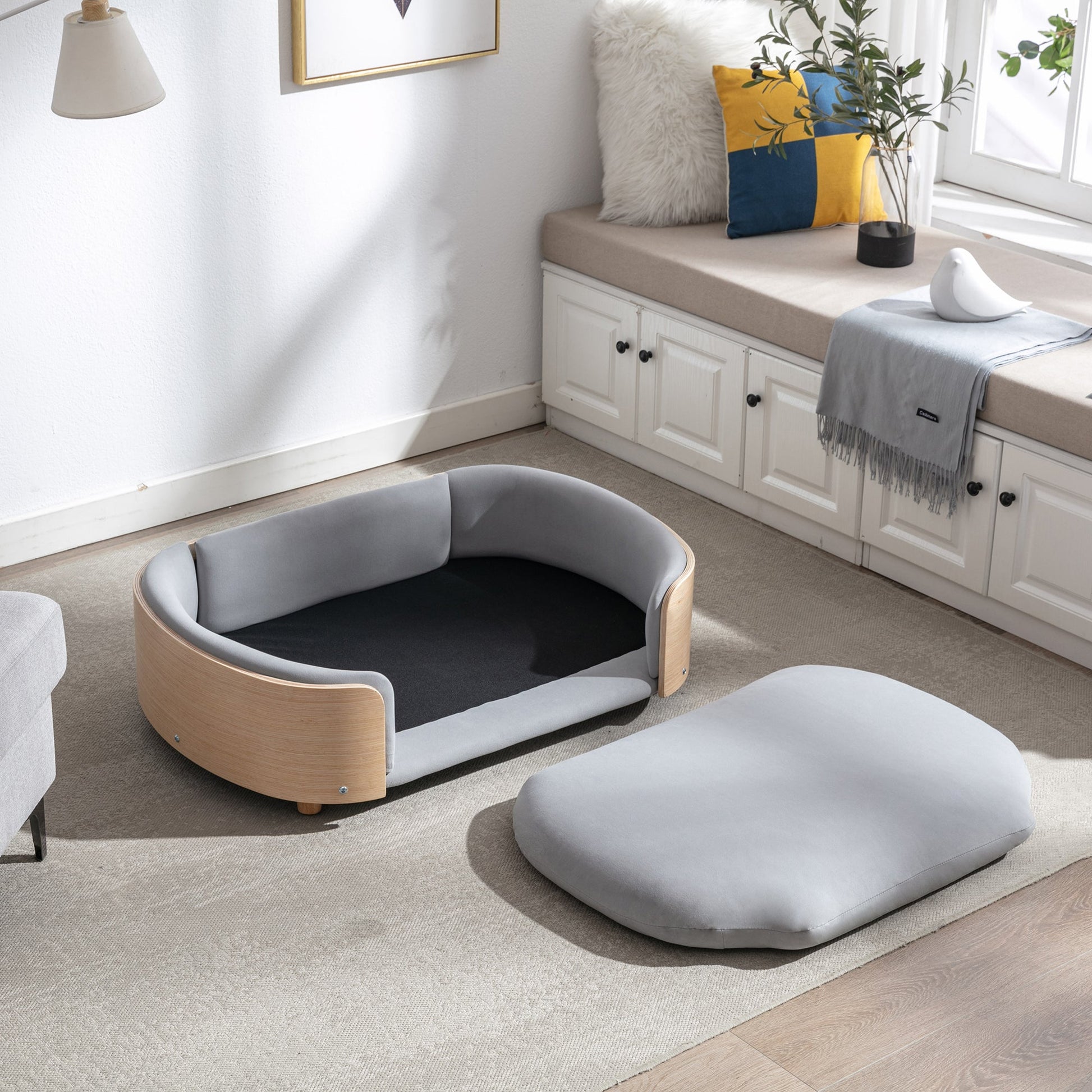 Scandinavian elevated dog bed with solid wood legs and charcoal velvet cushion on Tampa Home & Garden Store