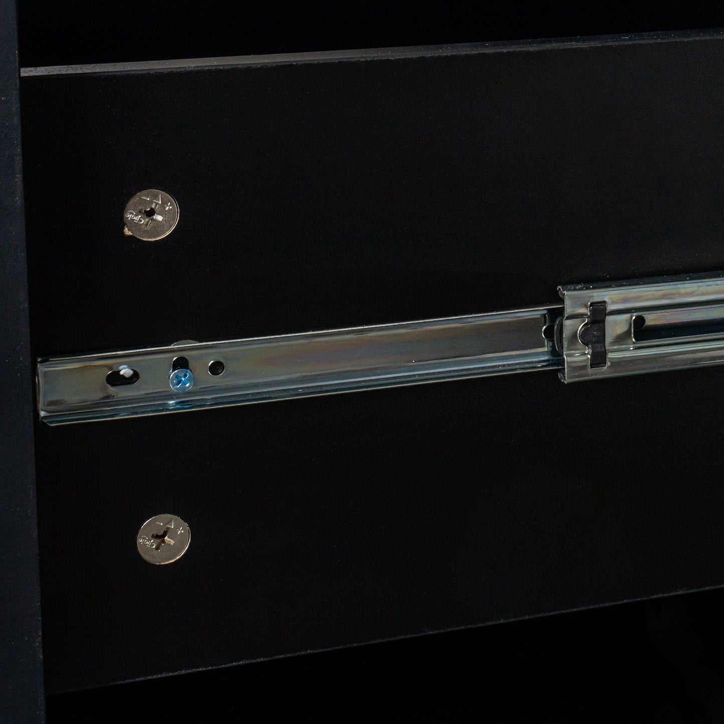 Home Office Desk drawer interior in antiqued black with metal slide rails and a scale coin on Tampa Home & Garden Store