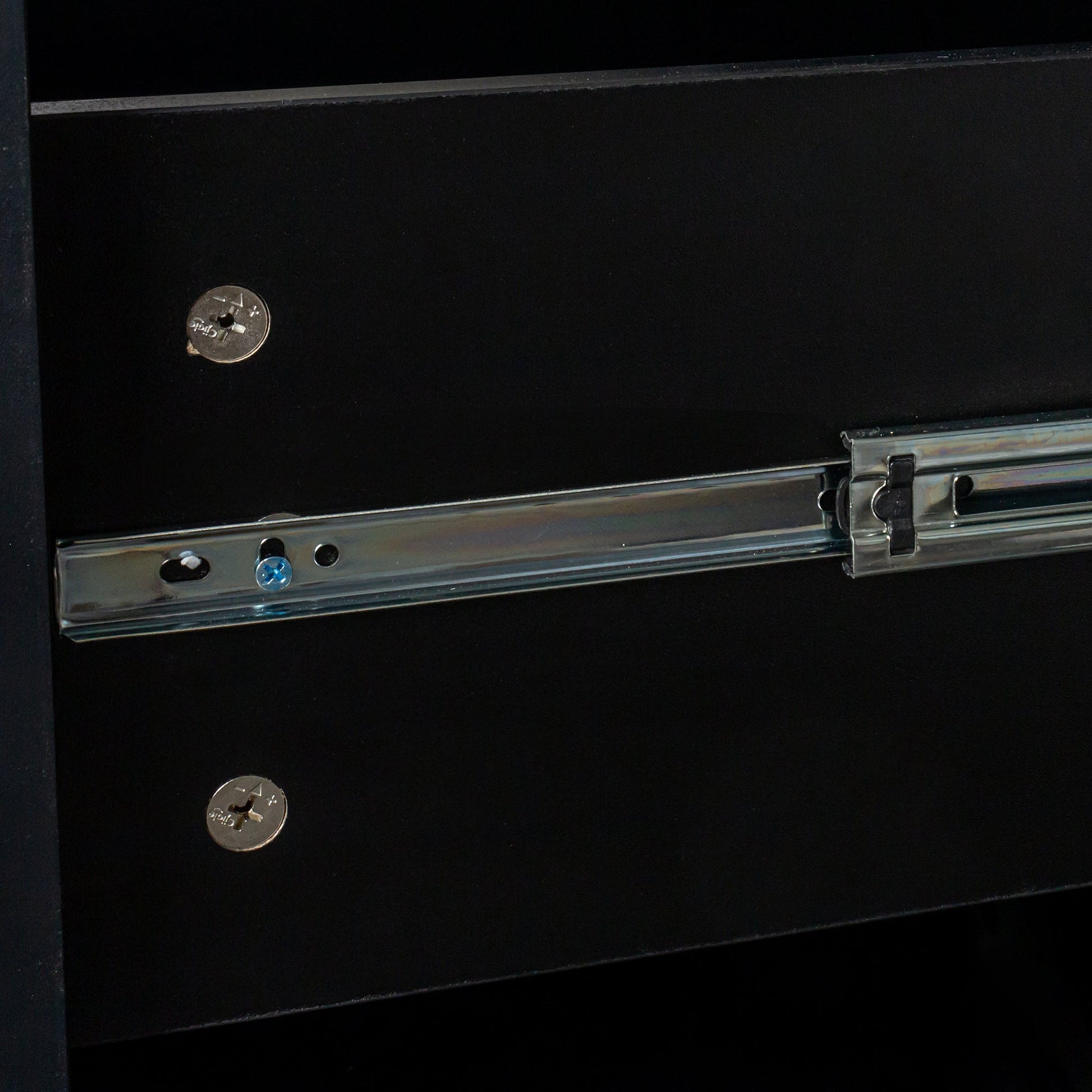 Home Office Desk drawer interior in antiqued black with metal slide rails and a scale coin on Tampa Home & Garden Store