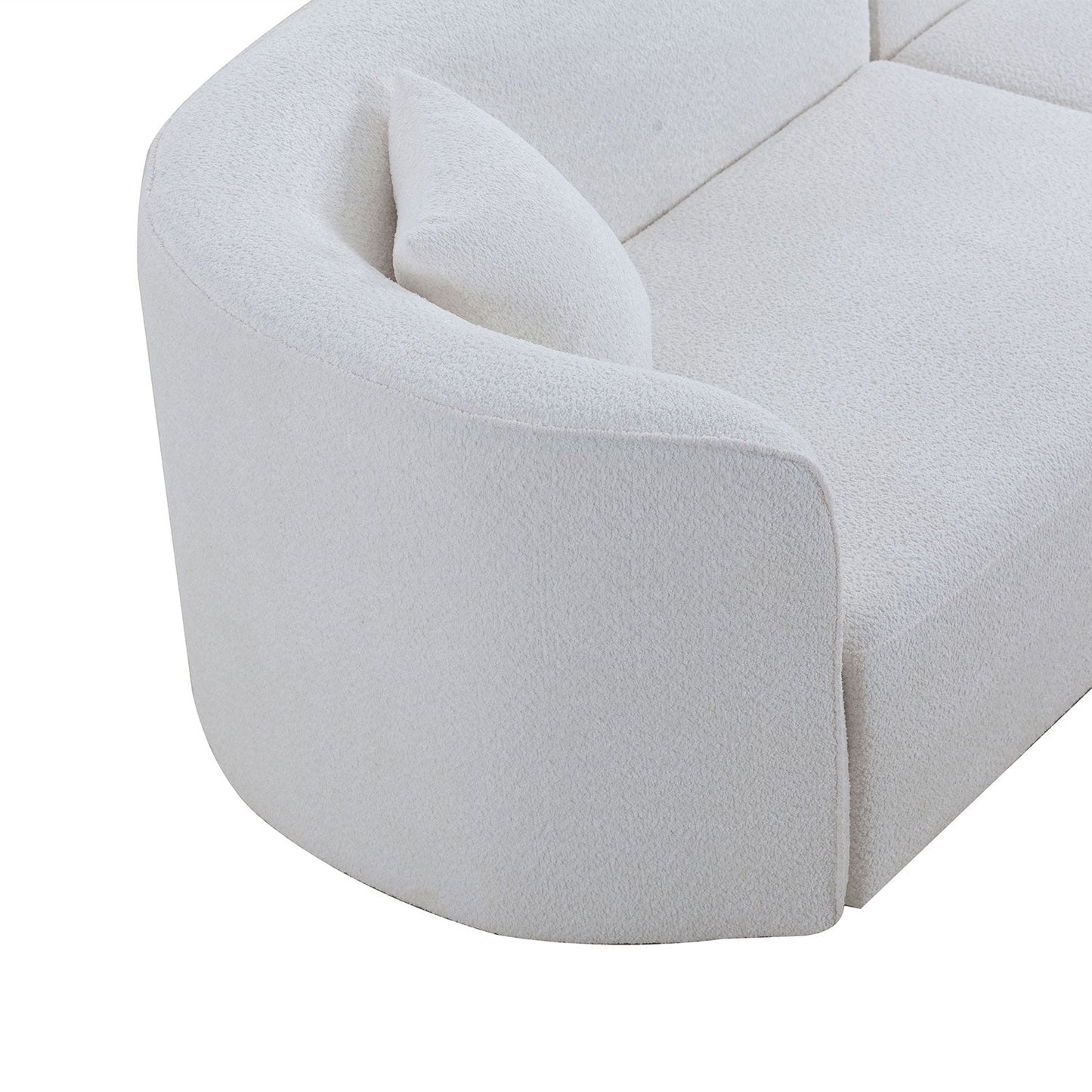 Curved white boucle sofa with plush upholstery and rounded armrest on Tampa Home & Garden Store