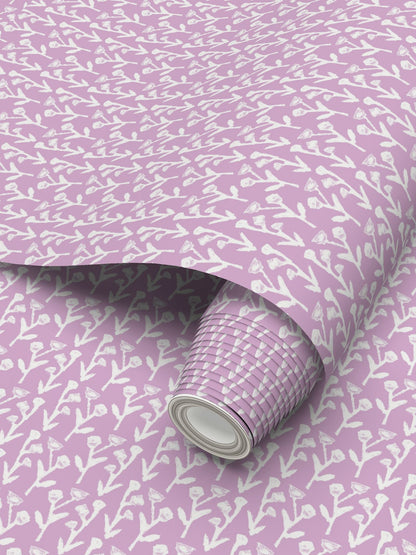 Ivy Manor Lilac wallpaper; repeat-pattern with white brushstroke motif; rolled sheet on Tampa Home & Garden Store