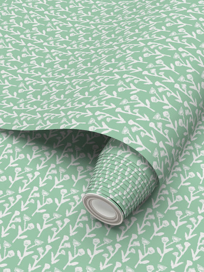 Ivy Manor Wallpaper Mint by Erin Donahue Tice, mint backdrop with brushstroke ivy repeat pattern on Tampa Home & Garden Store