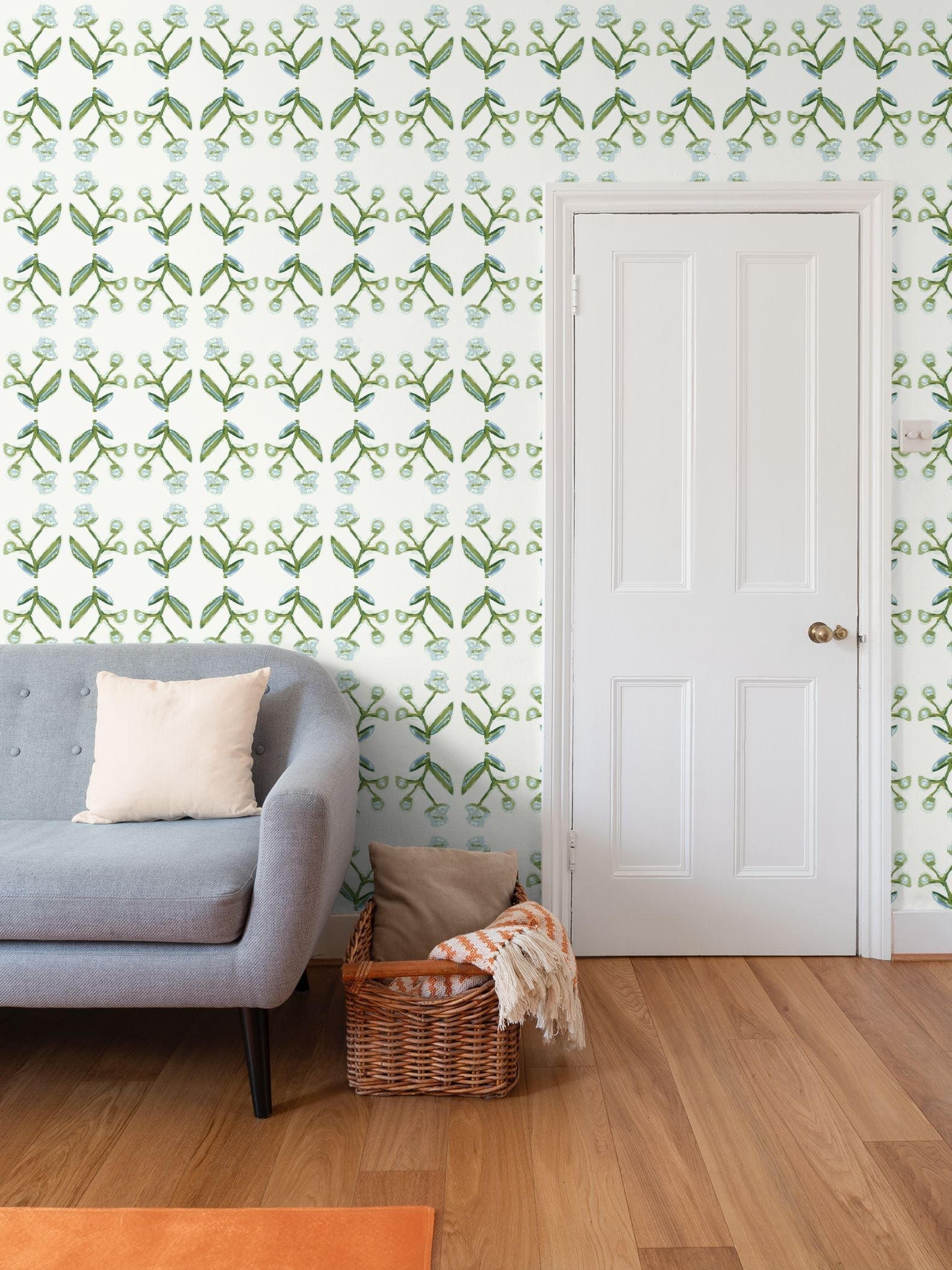 Antonia Wallpaper (Blue & Green) repeat pattern with green-blue botanical motifs in a room on Tampa Home & Garden Store
