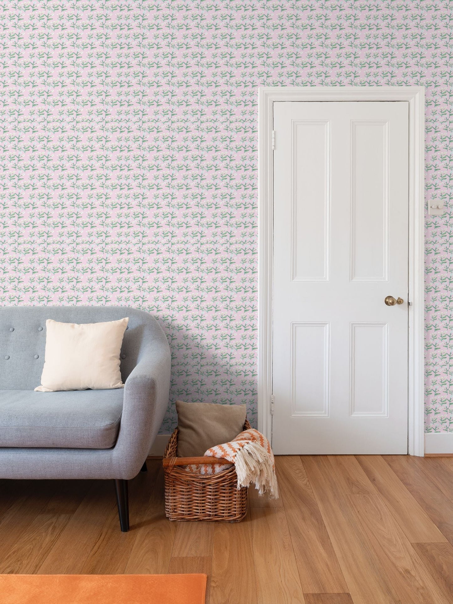 Sydney Wallpaper Tulip Pink repeat-pattern wallpaper with green floral stems on pink background on Tampa Home & Garden Store
