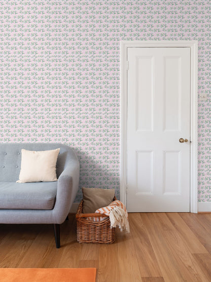 Sydney Wallpaper Tulip Pink repeat-pattern wallpaper with green floral stems on pink background on Tampa Home & Garden Store