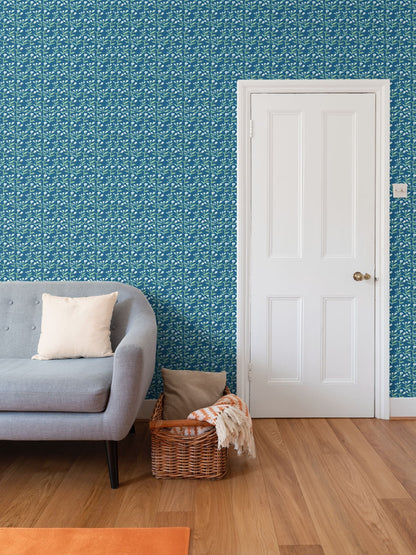 Sydney Wallpaper Marine by Erin Donahue Tice; teal repeat pattern with leaf stems on teal wall on Tampa Home & Garden Store