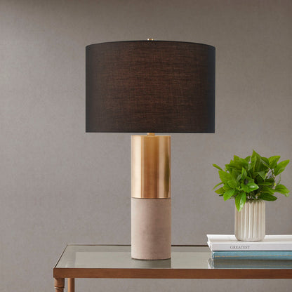 Concrete Table Lamp, black shade, brass accent atop concrete base on glass table on Tampa Home & Garden Store