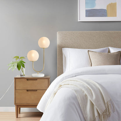 Metal 2-Light Globe Table Lamp with frosted glass globes, brass-gold finish on wood nightstand on Tampa Home & Garden Store