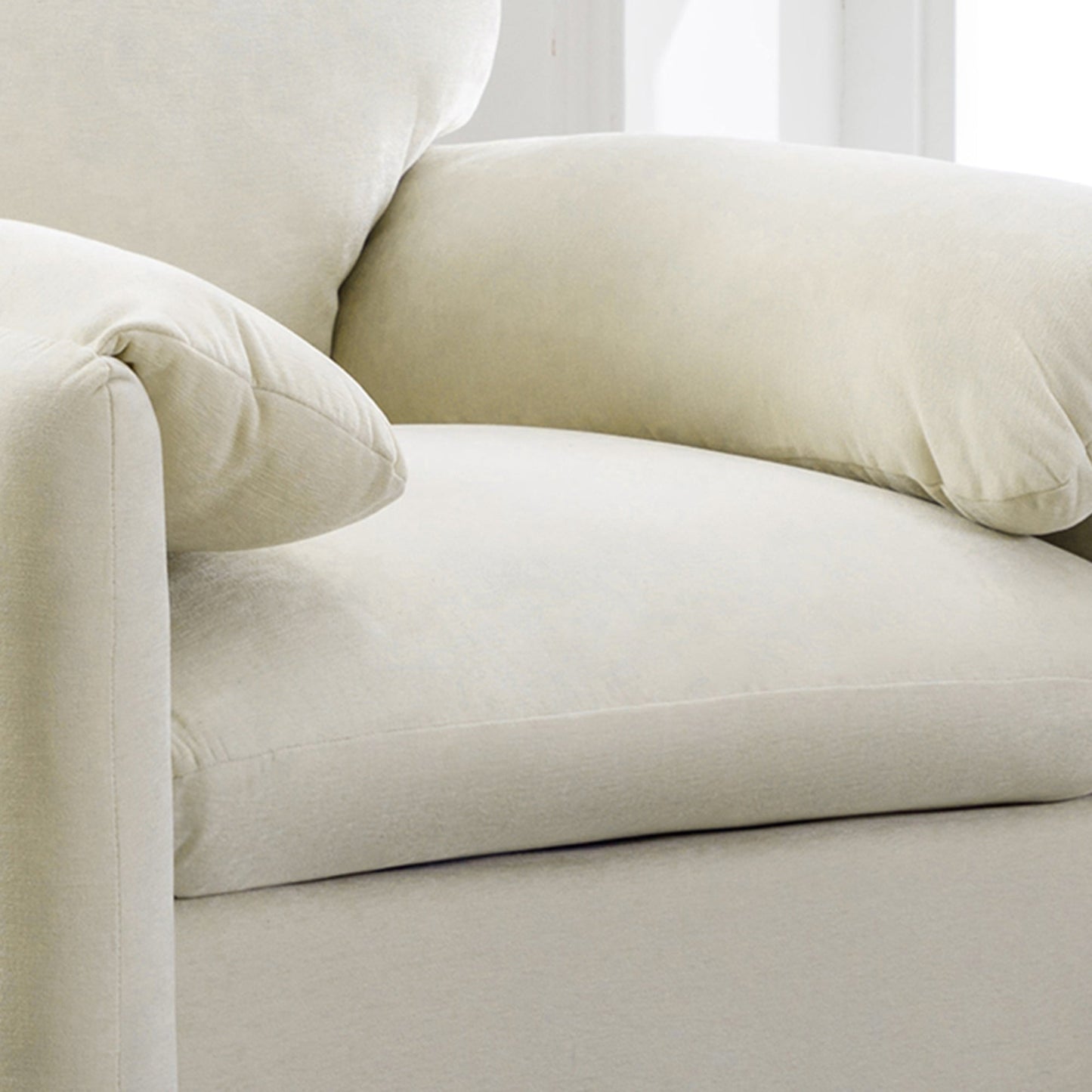 Modern style chenille oversized armchair in cream with plush upholstery and visible seams on Tampa Home & Garden Store