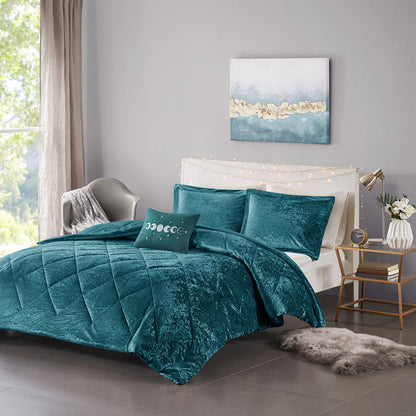 Full/Queen velvet comforter set in teal with two shams and a moon-pattern throw pillow on bed on Tampa Home & Garden Store
