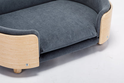 Scandinavian Style Elevated Dog Bed with dark blue velvet cushion and light wood frame on Tampa Home & Garden Store