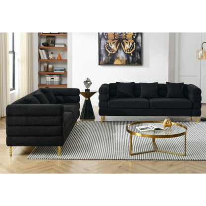HouseOfZazla two 3-Seater sofas in black teddy fabric with gold legs in a modern living room on Tampa Home & Garden Store