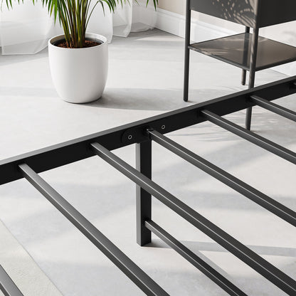 Full-size bed frame with storage headboard in dark gray metal featuring slatted rails on Tampa Home & Garden Store