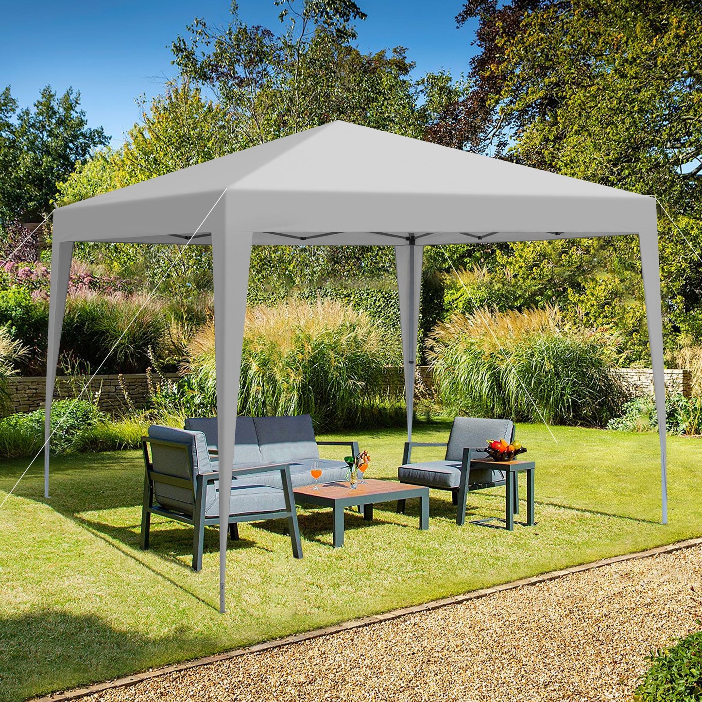 Outdoor 10x10 ft pop-up gazebo canopy tent, white top and gray frame with lounge seating on Tampa Home & Garden Store