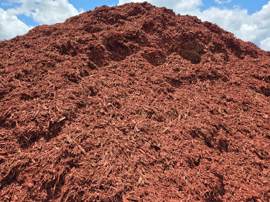 Pile of bulk red mulch for sale delivered.