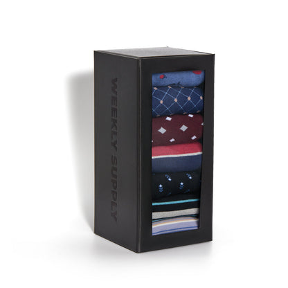 Weekly Sply 7-Pack boardroom dress socks by DeadSoxy in black box; seven pairs with blue argyle on Tampa Home & Garden Store