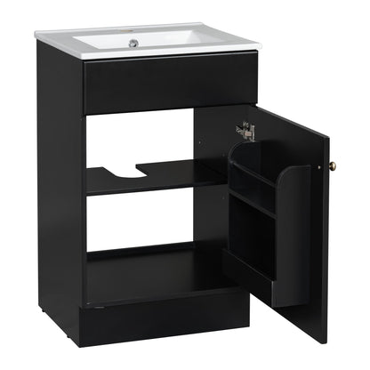 Bathroom vanity with sink and white countertop atop black cabinet, adjustable shelf visible on Tampa Home & Garden Store