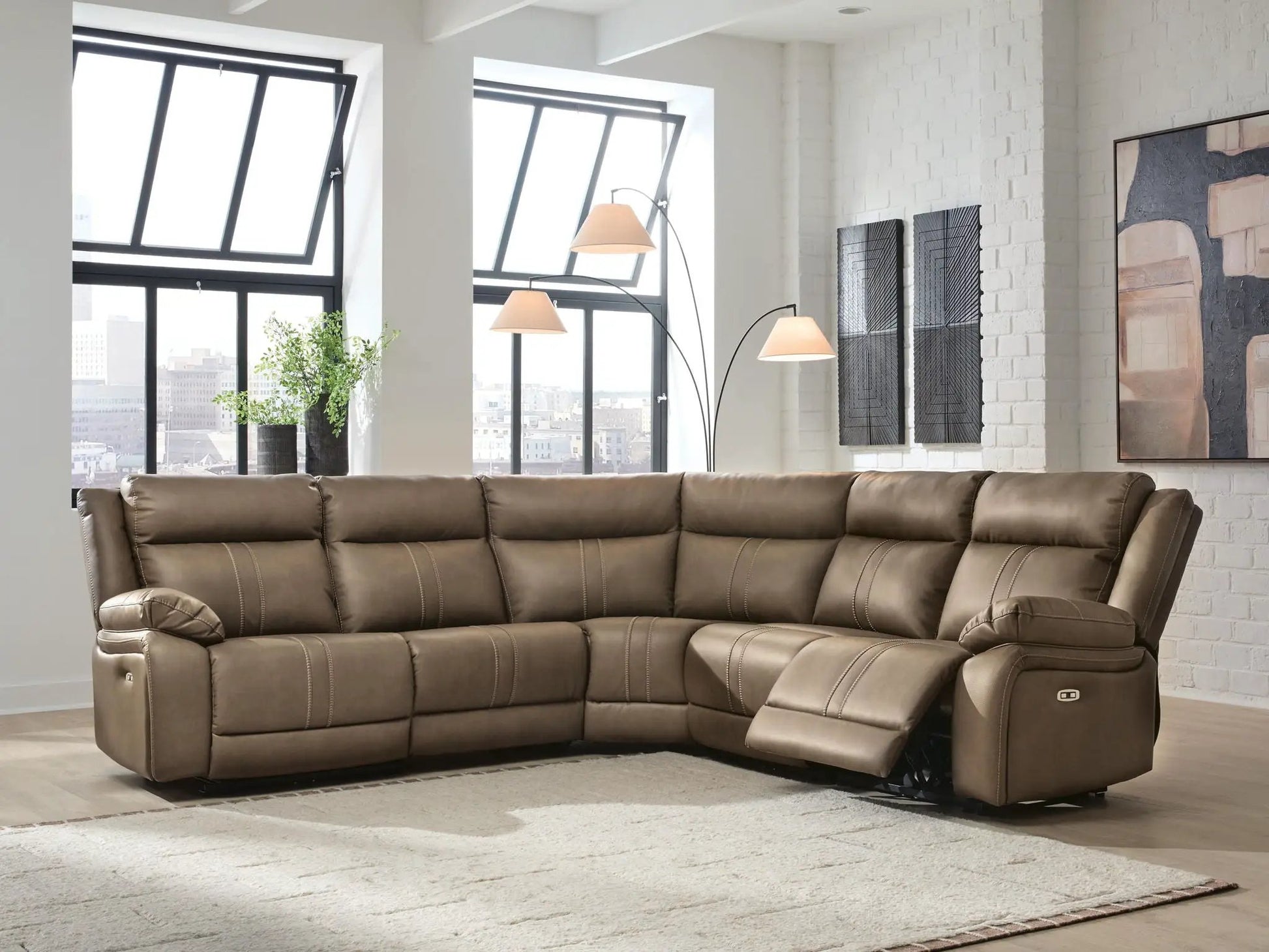Max-Momentum reclining sectional in brown leather with plush cushions in a living room on Tampa Home & Garden Store