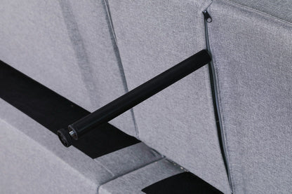 Zoey Convertible Sleeper Chair with Side Pocket in grey fabric, black metal support leg on Tampa Home & Garden Store