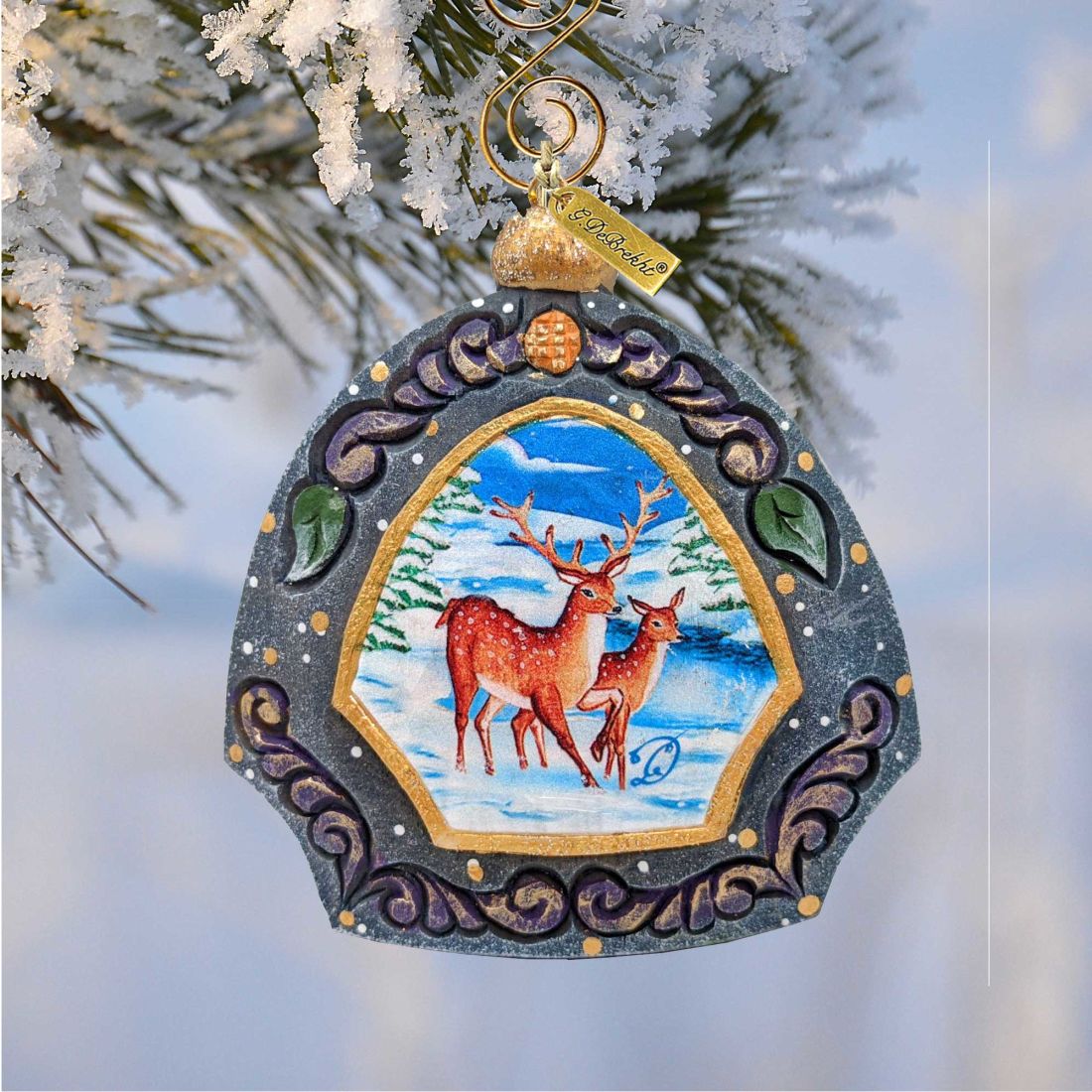 Moose Family Sculpted Ornament by G. DeBrekht with gray frame and deer winter scene on Tampa Home & Garden Store