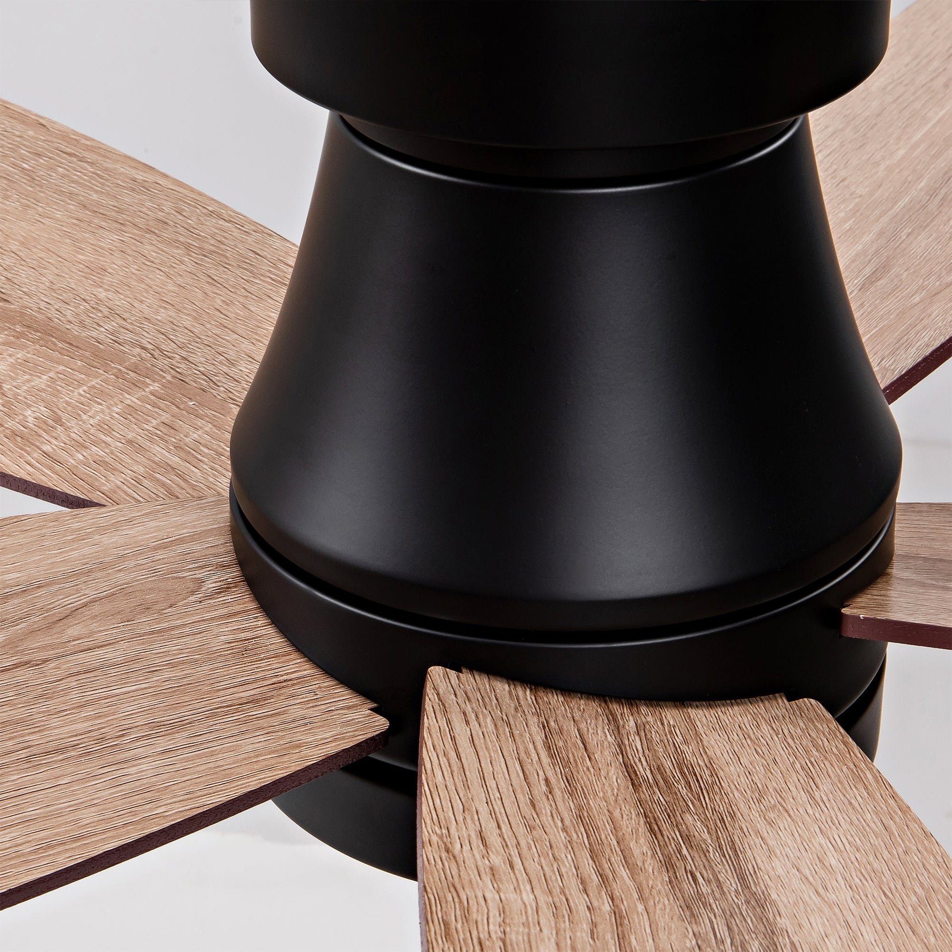 Ceiling fan base with black finish and natural wood blades, flush mount on Tampa Home & Garden Store