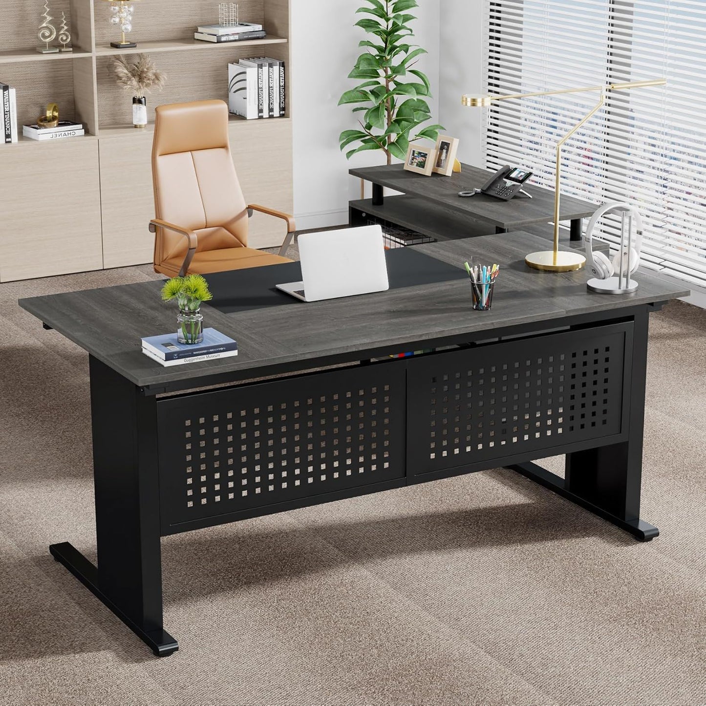 Black L-shaped executive desk with file cabinet and perforated front panels in a modern office on Tampa Home & Garden Store