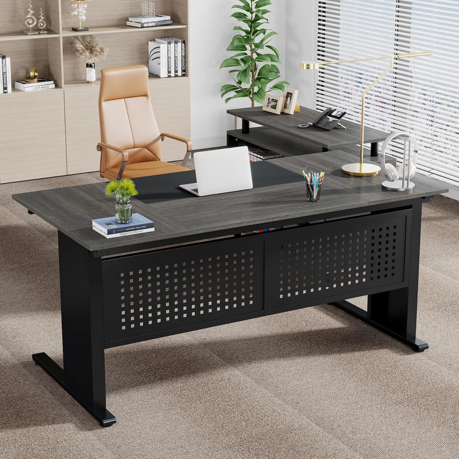 Black L-shaped executive desk with file cabinet and perforated front panels in a modern office on Tampa Home & Garden Store