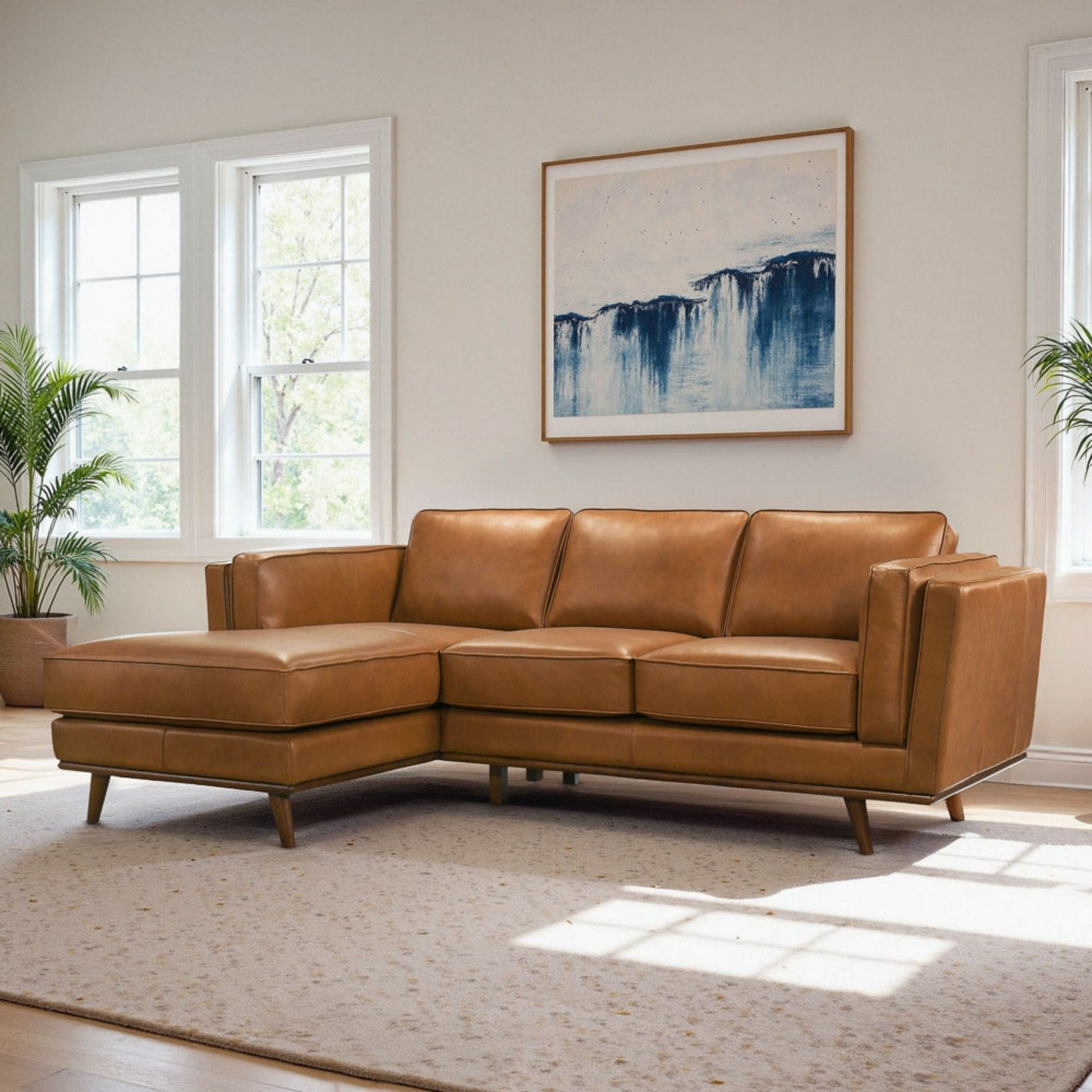 Chase sectional sofa by HouseOfZazla in tan leather with slim wooden legs in living room on Tampa Home & Garden Store