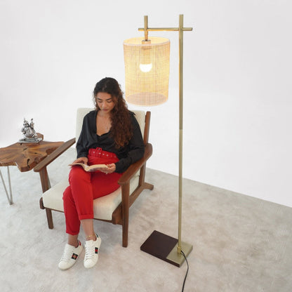 Brizo tall corner floor lamp in gold with a woven drum shade on Tampa Home & Garden Store