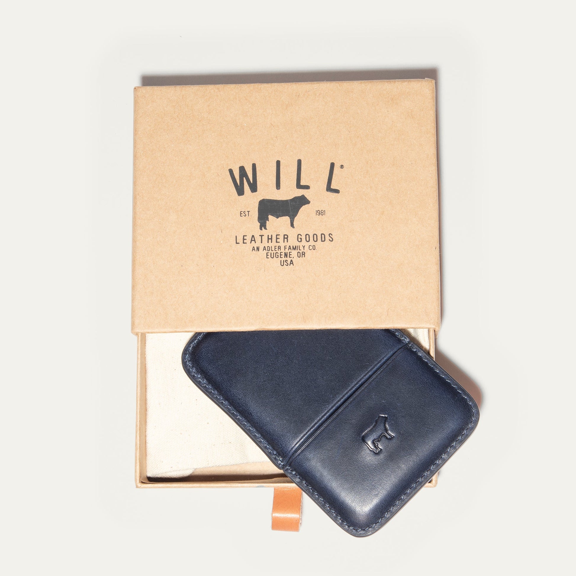 Molded Card Cases navy and dark leather by Will Leather Goods on kraft box on Tampa Home & Garden Store