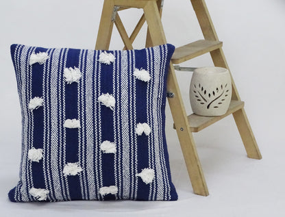 Blue 20x20 decorative throw pillow with white pom-pom details and striped weave by Vibhsa on Tampa Home & Garden Store