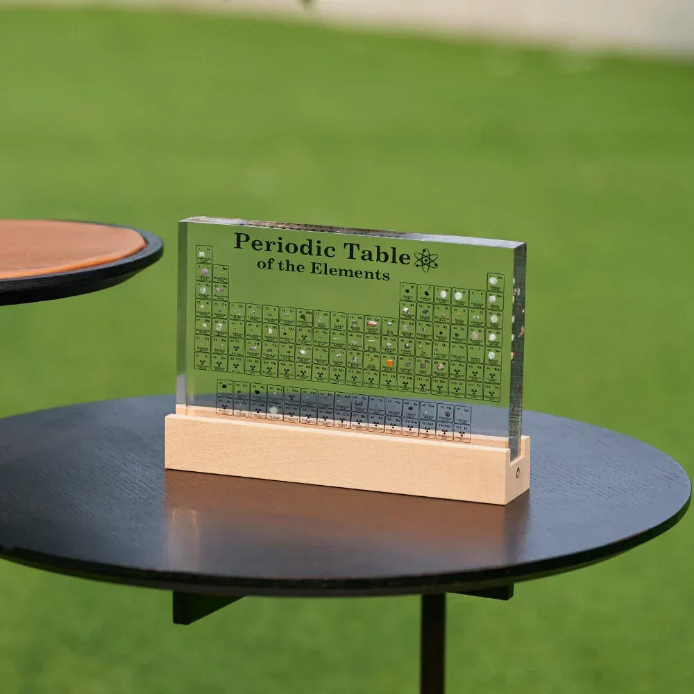 LED Periodic Table Element Display Moktan Sabai on green-tinted acrylic panel with wooden base on Tampa Home & Garden Store