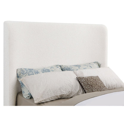 HouseOfZazla Vindra queen sleigh bed cream upholstery with blue floral pillows on Tampa Home & Garden Store