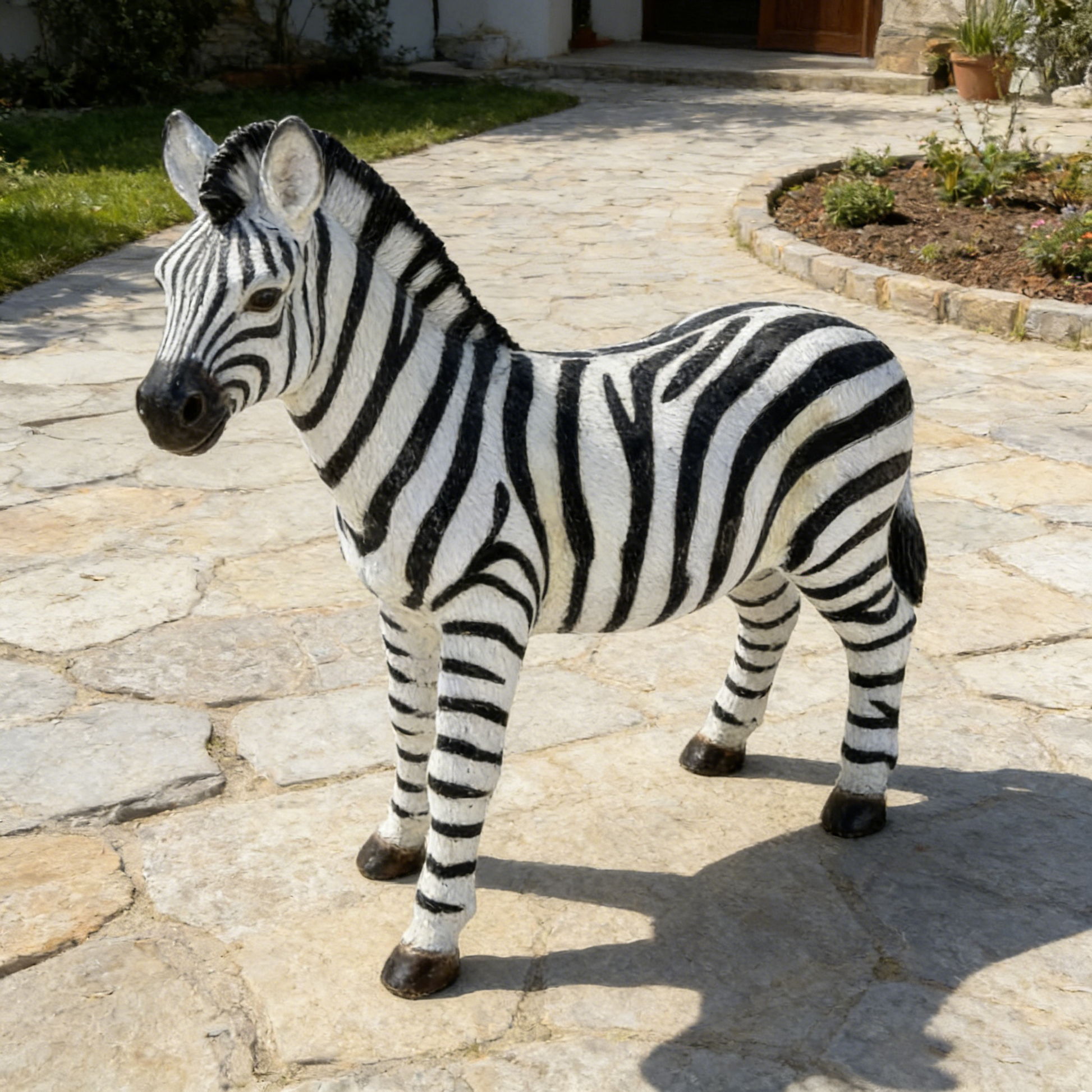 Simulated Zebra Garden Statue by HouseOfZazla, black-and-white striped yard sculpture on Tampa Home & Garden Store