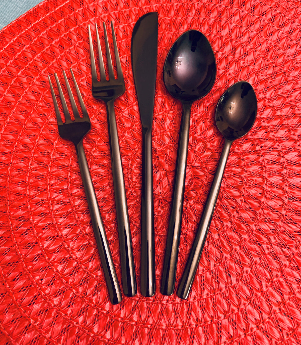 Vibhsa black flatware set stainless steel 20 pc, 5-piece forks knife spoons on red woven mat on Tampa Home & Garden Store