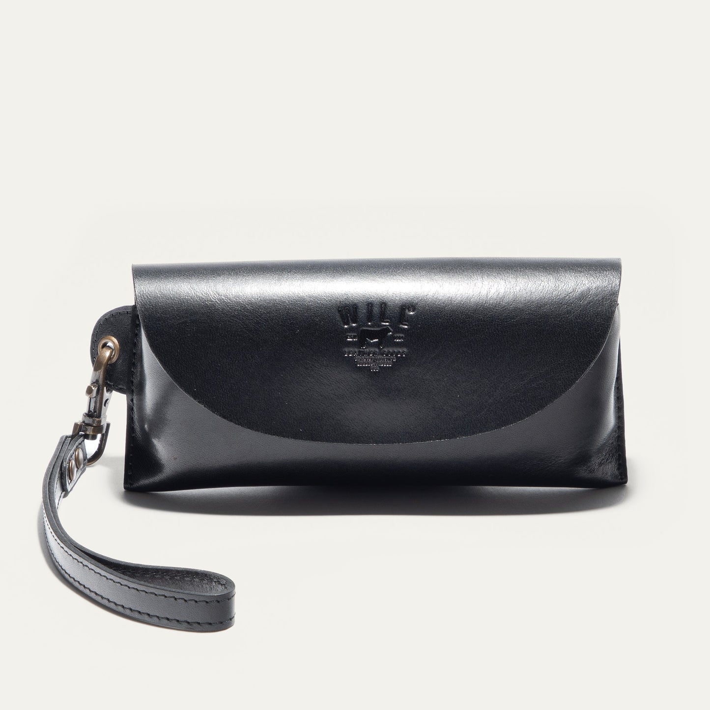 Eyeglass case by Will Leather Goods in black leather with embossed logo, strap on Tampa Home & Garden Store