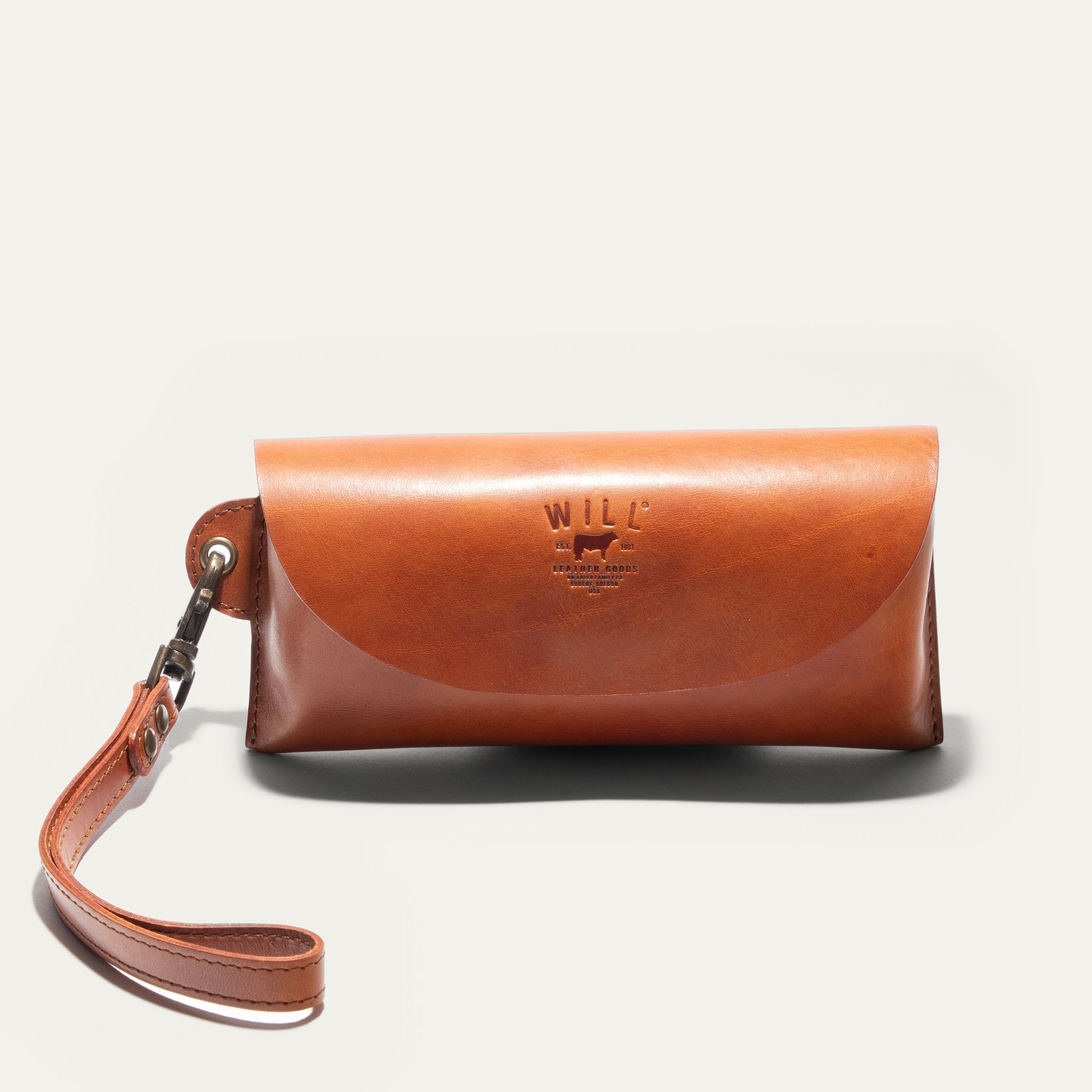 The Eyeglass Case by Will Leather Goods, brown leather with pink-tan strap on Tampa Home & Garden Store