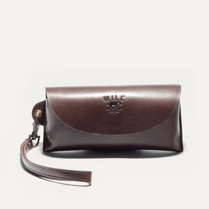 Eyeglass case by Will Leather Goods in brown leather with embossed logo and strap on Tampa Home & Garden Store
