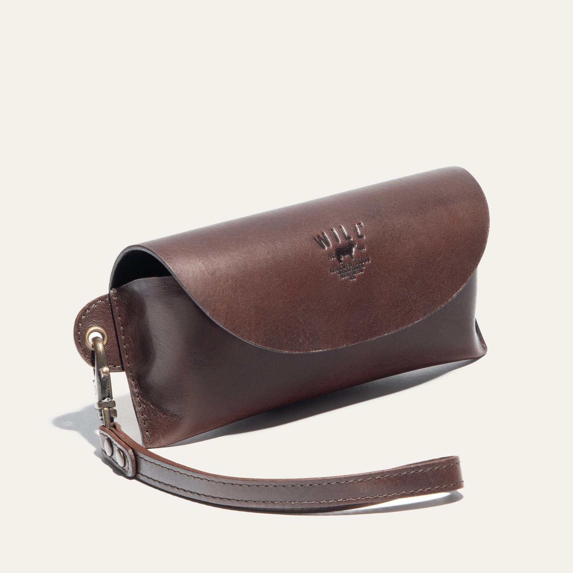 Will Leather Goods eyeglass case in brown leather with embossed logo and strap on Tampa Home & Garden Store