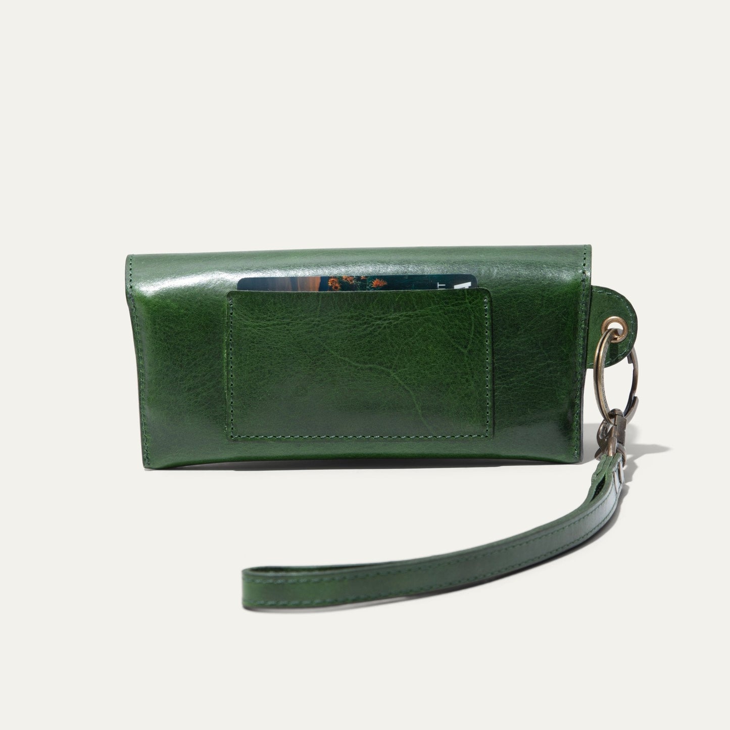 The Eyeglass Case, green leather Will Leather Goods with card slot and strap on Tampa Home & Garden Store