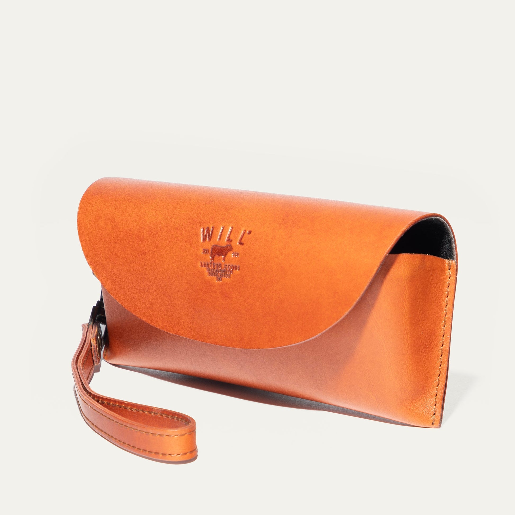 The Eyeglass Case orange leather by Will Leather Goods with embossed logo on Tampa Home & Garden Store