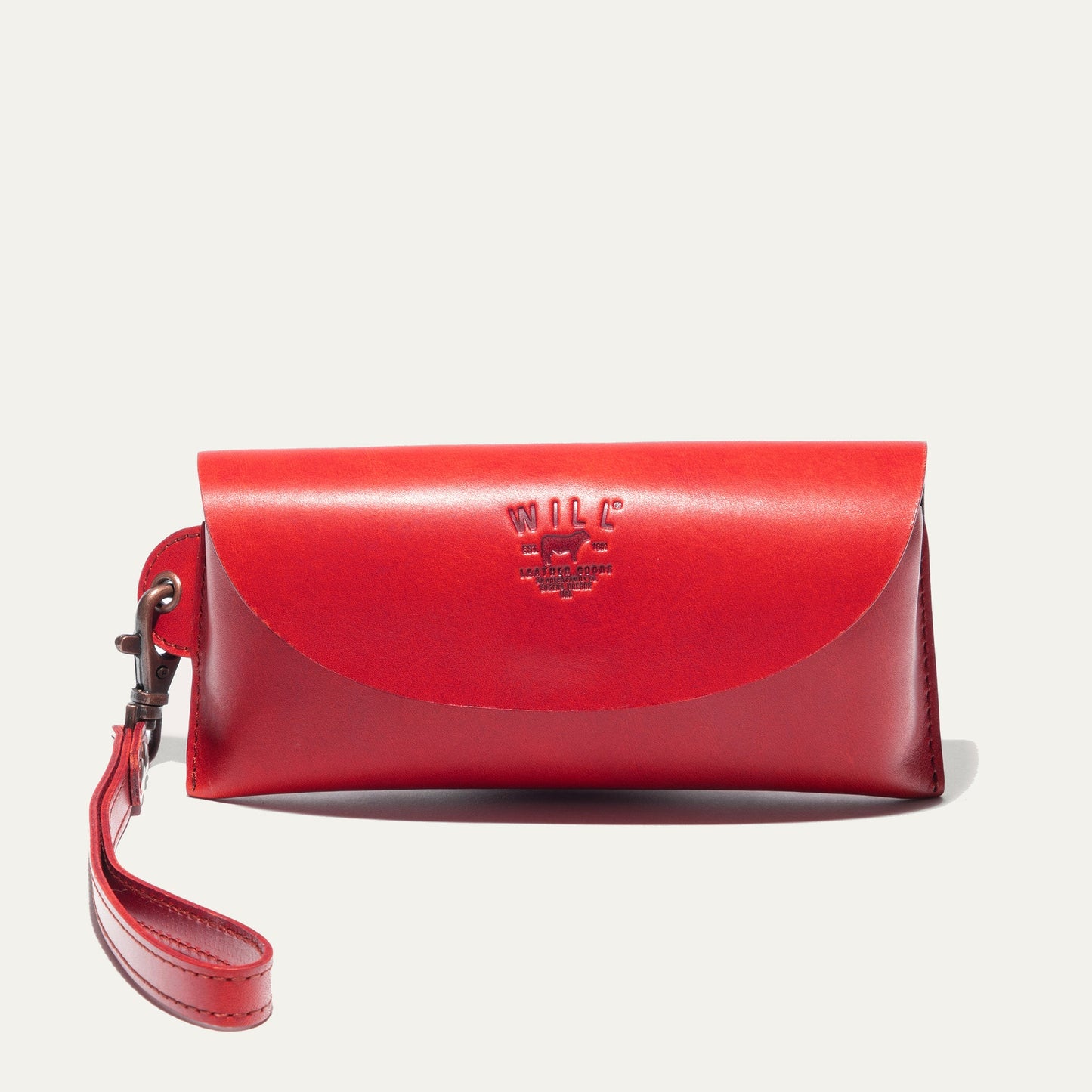 Eyeglass case by Will Leather Goods, red leather with embossed logo and strap on Tampa Home & Garden Store